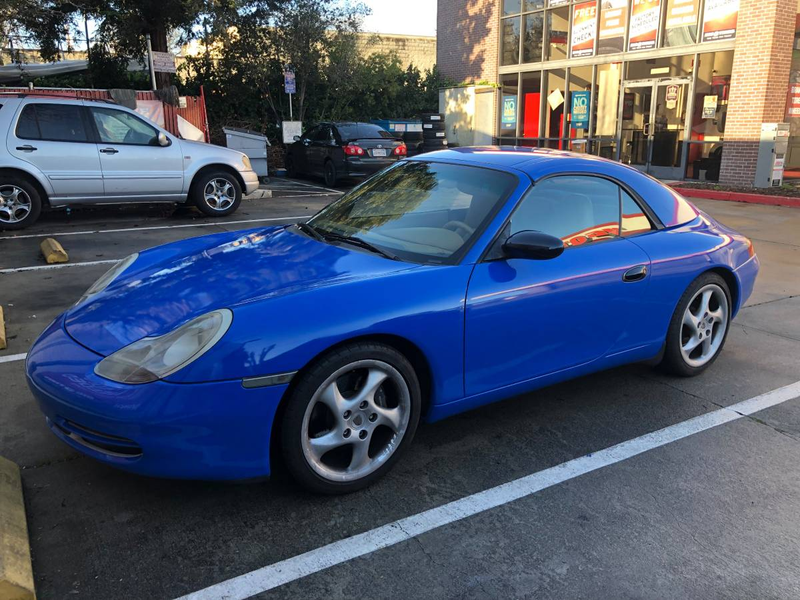 Illustration for article titled At $16,999, Could This 1999 Porsche 911 Cabriolet Have You Saying “It’s a Wrap?”
